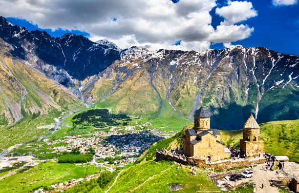 istock Gergeti Trinity Church under Mount Kazbegi in Georgia 1160223140