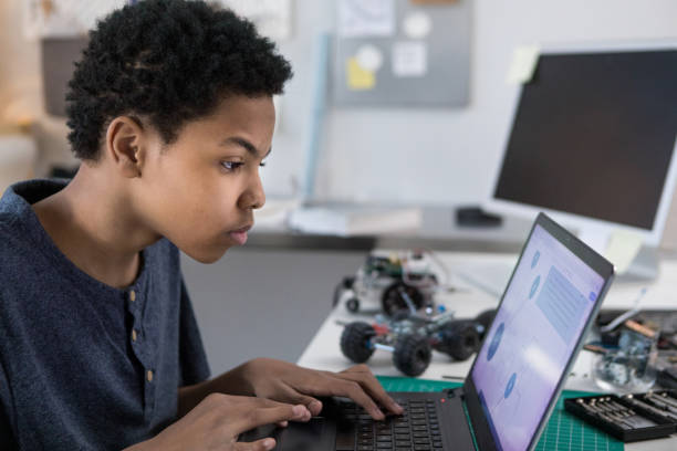 istock Teenage boy studies for chemistry test 1160223573