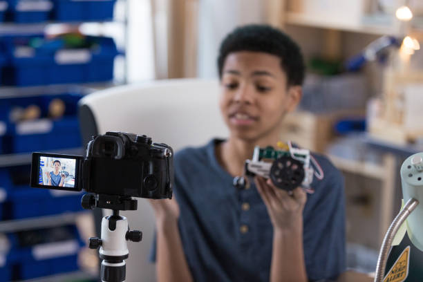 Young teenage boy vlogs about a robot kit