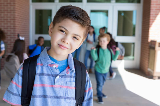 istock Young boy patiently waits for school to start 1160223681