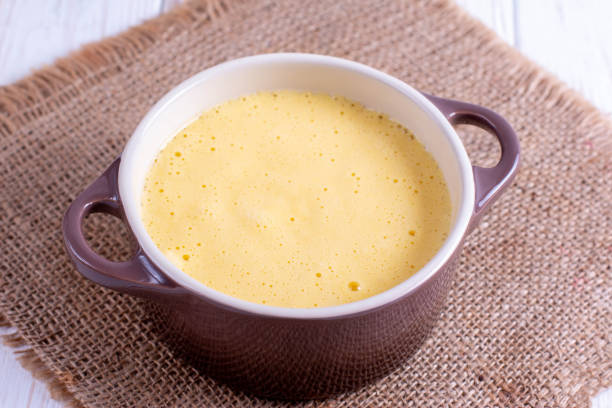 istock Dough in ceramic form. Cooking cupcake in the microwave 1160227071