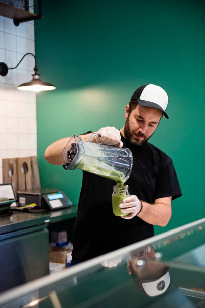 istock Owner working in zero waste oriented grocery and take out food store. 1160228936