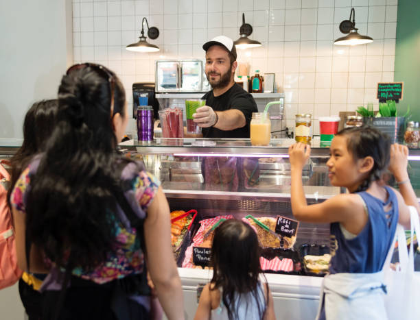 istock Customers in zero waste oriented grocery and take out food store. 1160230209
