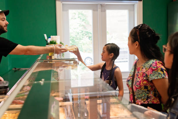 istock Customers in zero waste oriented grocery and take out food store. 1160230227
