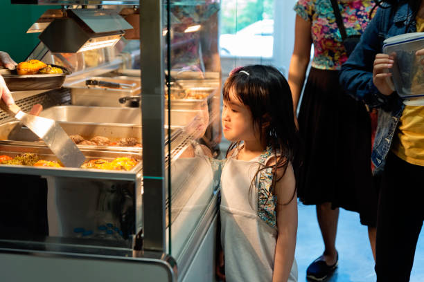 istock Customers in zero waste oriented grocery and take out food store. 1160230241