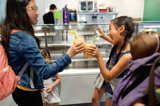 Customers in zero waste oriented grocery and take out food store.