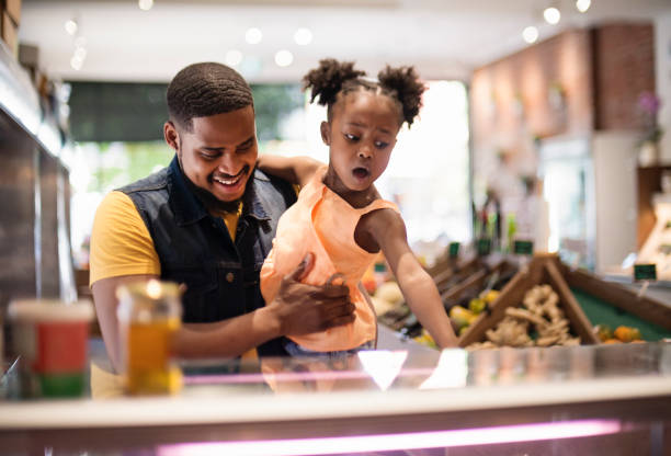 Customers in zero waste oriented grocery and take out food store.