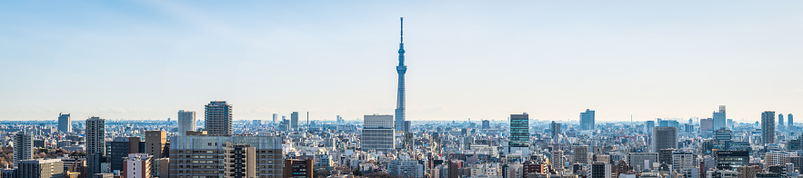 The iconic spire of the Tokyo Skytree overlooking the highrise cityscape in the heart of central Tokyo, Japan’s vibrant capital city.