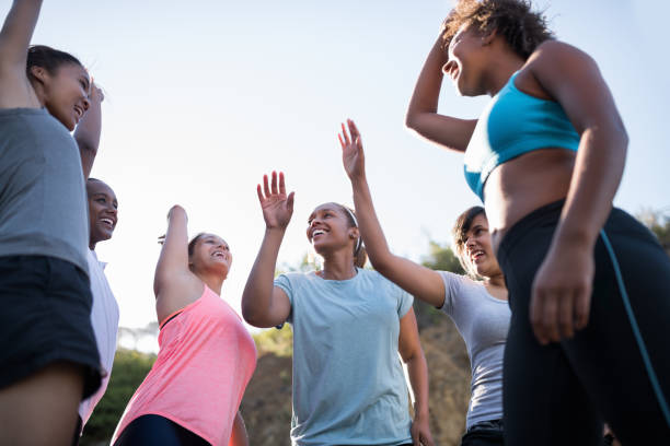 istock Happy soccer players motivating each other 1160232822