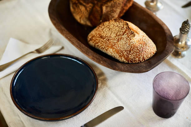 istock Vegan food, sesame bread and plate on a table. 1160233827