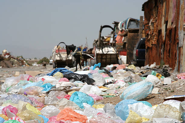 Poverty Homes at a garbage dump in Mexico City. poverty mexico environment slum stock pictures, royalty-free photos & images