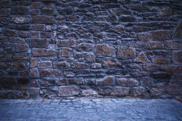 istock background and texture of old stone and cave 1160238778