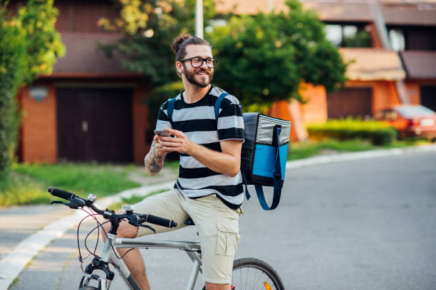 istock Tourist on bike searching 1160239879