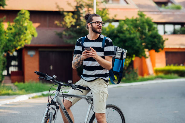 istock Man cycling and searching 1160239892