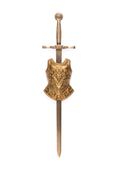 istock golden armor and sword on a white background 1160244678