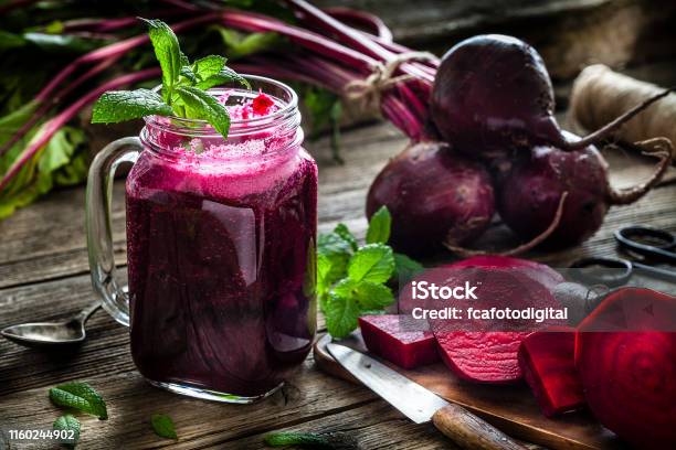Healthy Drink Beet Juice On Rustic Wooden Table Stock Photo - Download Image Now - Common Beet, Beet, Juice - Drink
