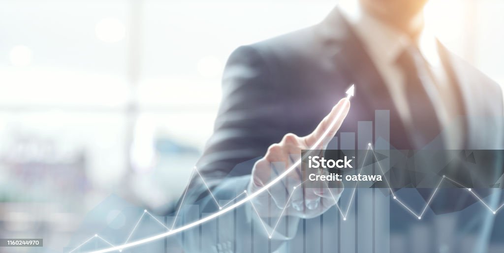 Development and growth concept. Businessman plan growth and increase of positive indicators in his business. Growth Stock Photo