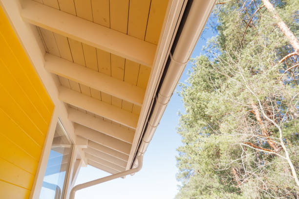istock Gutter on house corner. Metal eave on roof 1160246178
