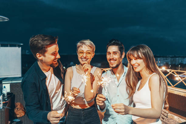 istock Friends enjoying a rooftop party 1160253018