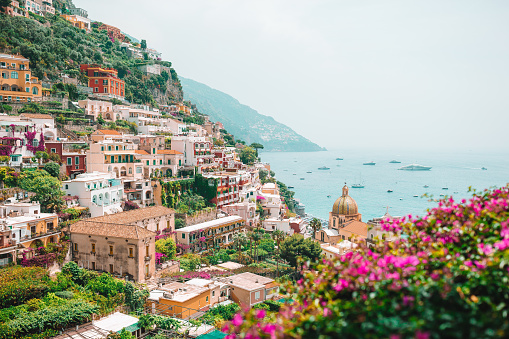 View of the town of Positano with flowers on Amalfi coast