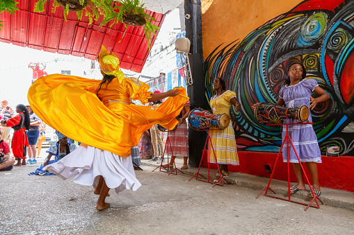 Havana, Cuba - May 29, 2019: Cuban people are performing an African Dance in the Old Havana City, Capital of Cuba, during a bright and sunny day.
