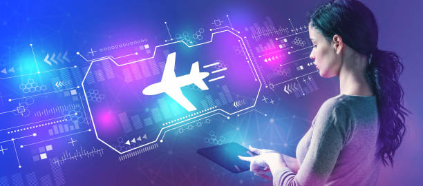 istock Airplane travel theme with woman using a tablet 1160257999
