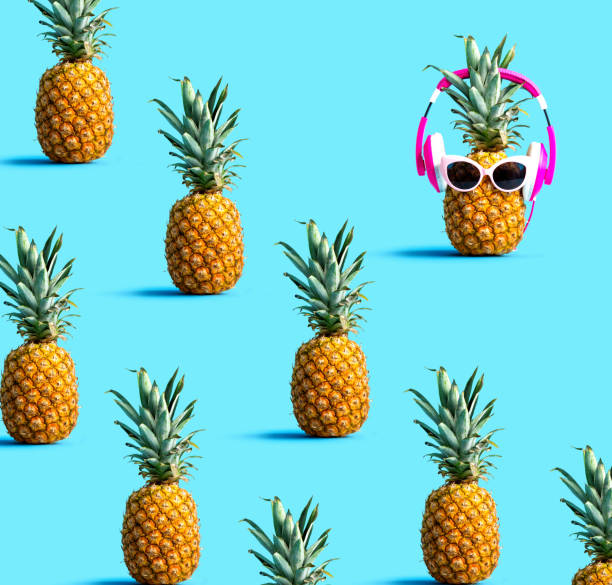 istock One out unique pineapple wearing headphones 1160259554
