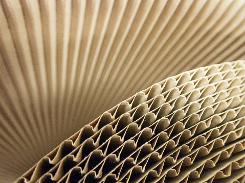 close up of cardboard corrugate in brown kraft color