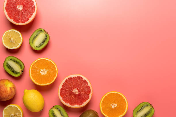 istock Creative fruit composition on pink background with hard shadows. Summer minimal concept. 1160272370