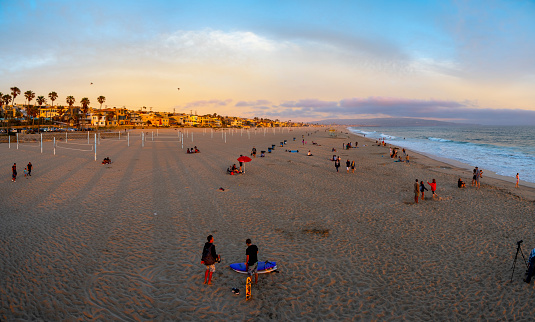 Los Angeles, California,USA - June 29 2019 : Visitors at Manhattan Beach near Los Angeles California.\nManhattan Beach is located 57 miles south west of Los Angeles and is very popular spot among local residents for beach activities.