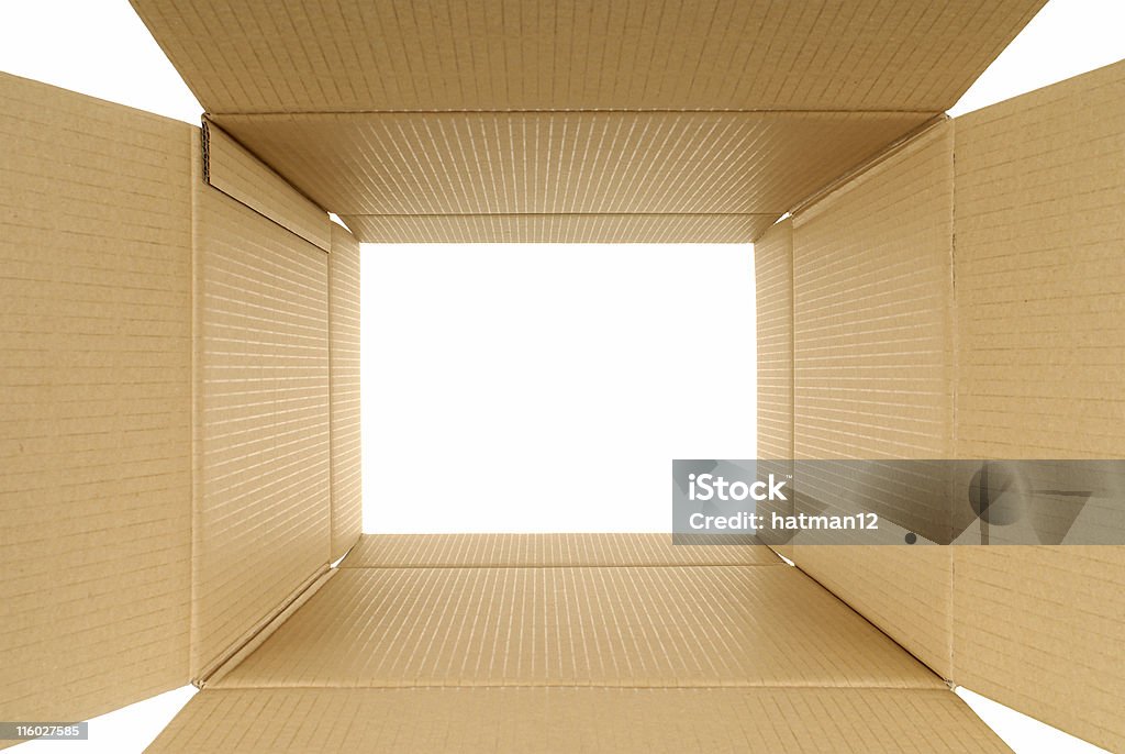 Looking through Looking through a plain brown cardboard box which is open at both ends (extreme wide angle with curvature correction).  Alternative version shown below: Cardboard Stock Photo