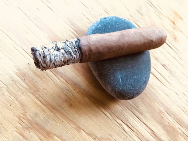 istock close up handmade cigar with long ashes 1160275962