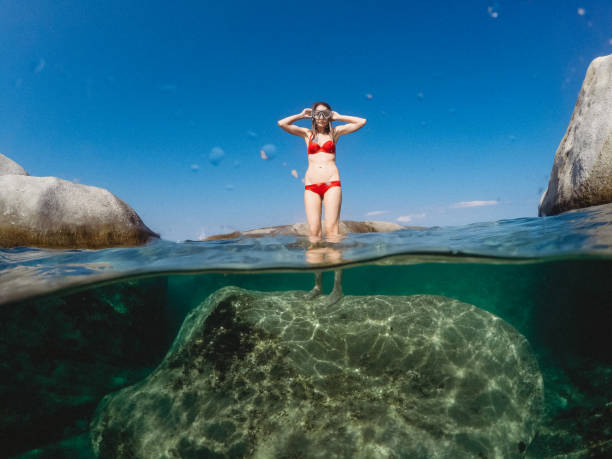 istock Woman snorkeling 1160277246