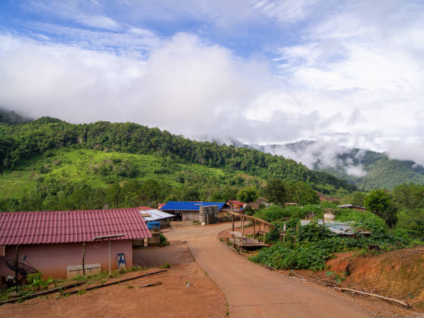 istock Green mountain scenery, fog in the mountains, sky covered with white clouds. 1160280542