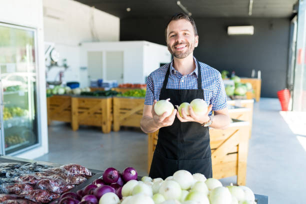 istock Owner Selling Healthy Vegetables In Shop 1160292943