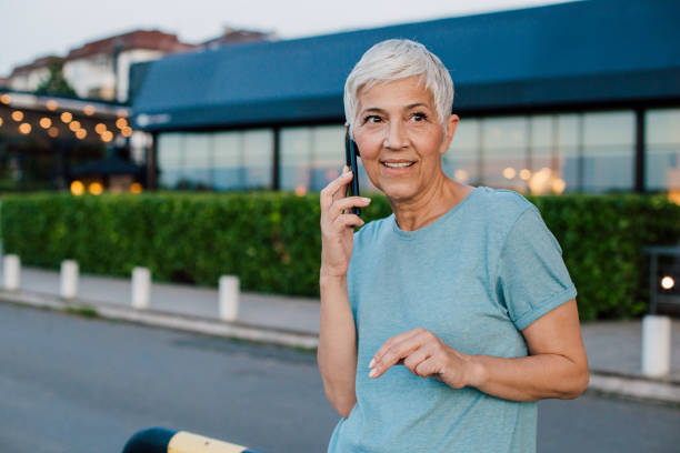 istock Senior woman talking on phone 1160294063