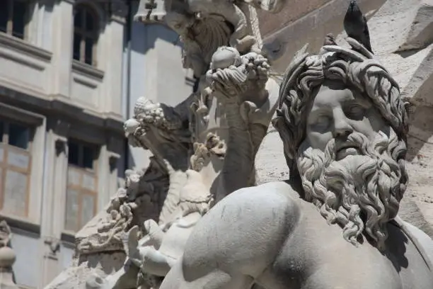 Photo of ROME, ITALY - MAYO 15 2019: Fountain of the Four Rivers in the Piazza Navona, designed in 1651 by Gian Lorenzo Bernini.