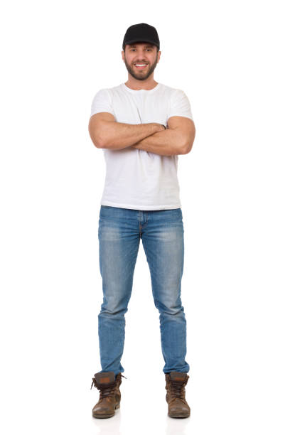 istock Confident And Happy Young Man Is Standing With Arms Crossed 1160297803