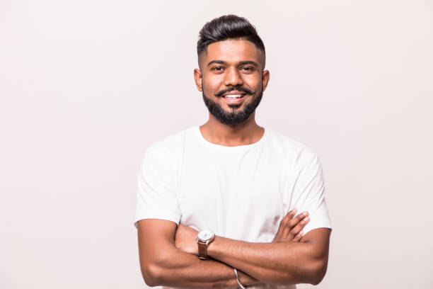 istock Indian young man standing with hands folded against white background 1160297812