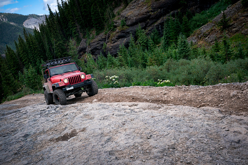 Colorado, USA - July13, 2018:  Backcountry jeep travels up a rocky path to Imogene Pass, Ouray