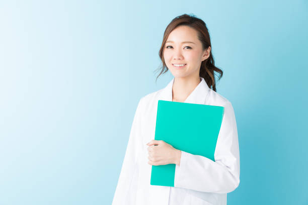 istock woman in a white coat 1160305743