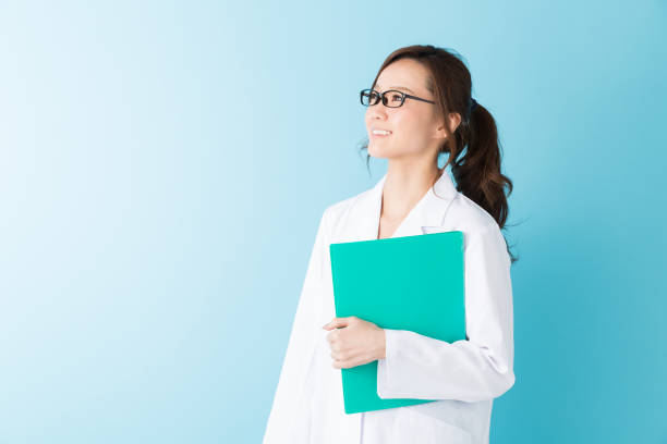 istock woman in a white coat 1160305840