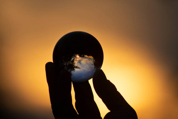 istock Hand Holding Crystal Ball Lens 1160313144
