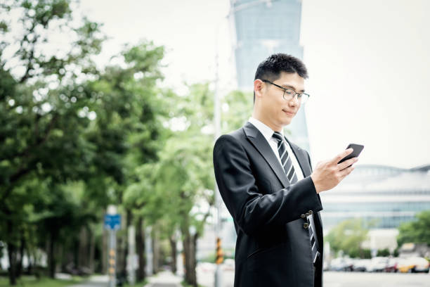 istock Asian businessman using  smartphone 1160313991