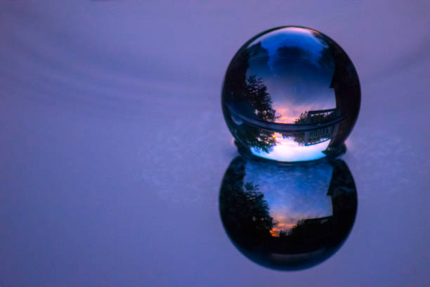 Crystal Ball Lens In Reflecting Pool stock photo