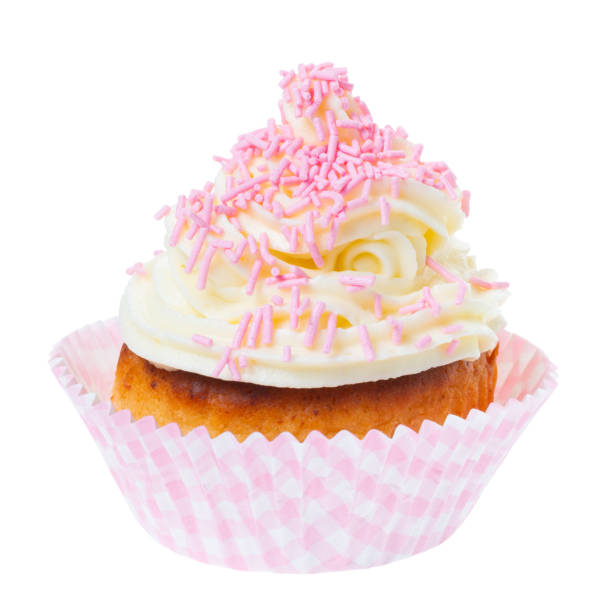 istock cupcake with whipped cream decorated pink sprinkles isolated on white background 1160319525