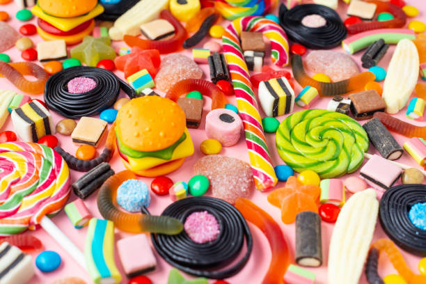 istock bright delicious multicolored caramel candies like background 1160319548