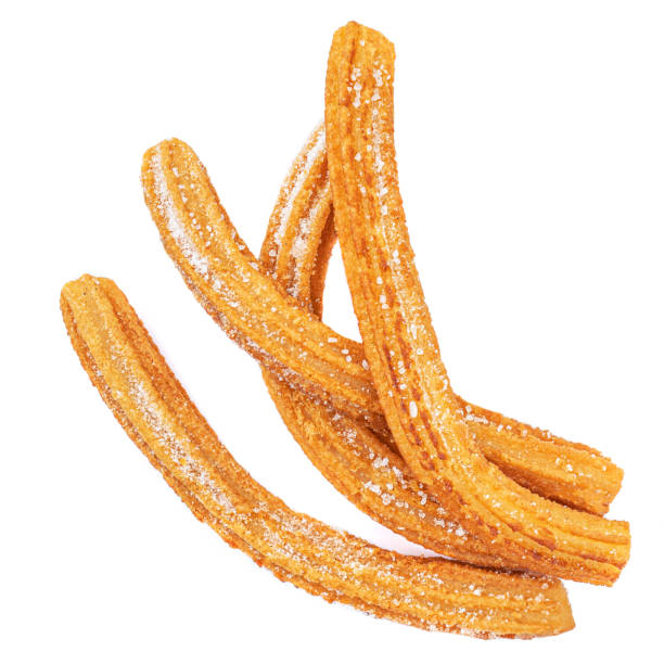 istock Churros isolated on white background. Traditional spanish snack - churro. Top view 1160328945