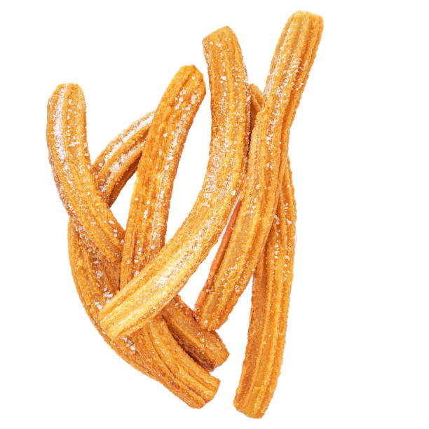 istock Churros isolated on white background. Mexican cuisine - Churro with sugar, top view 1160328997