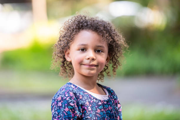 Smiling little girl looking at the camera